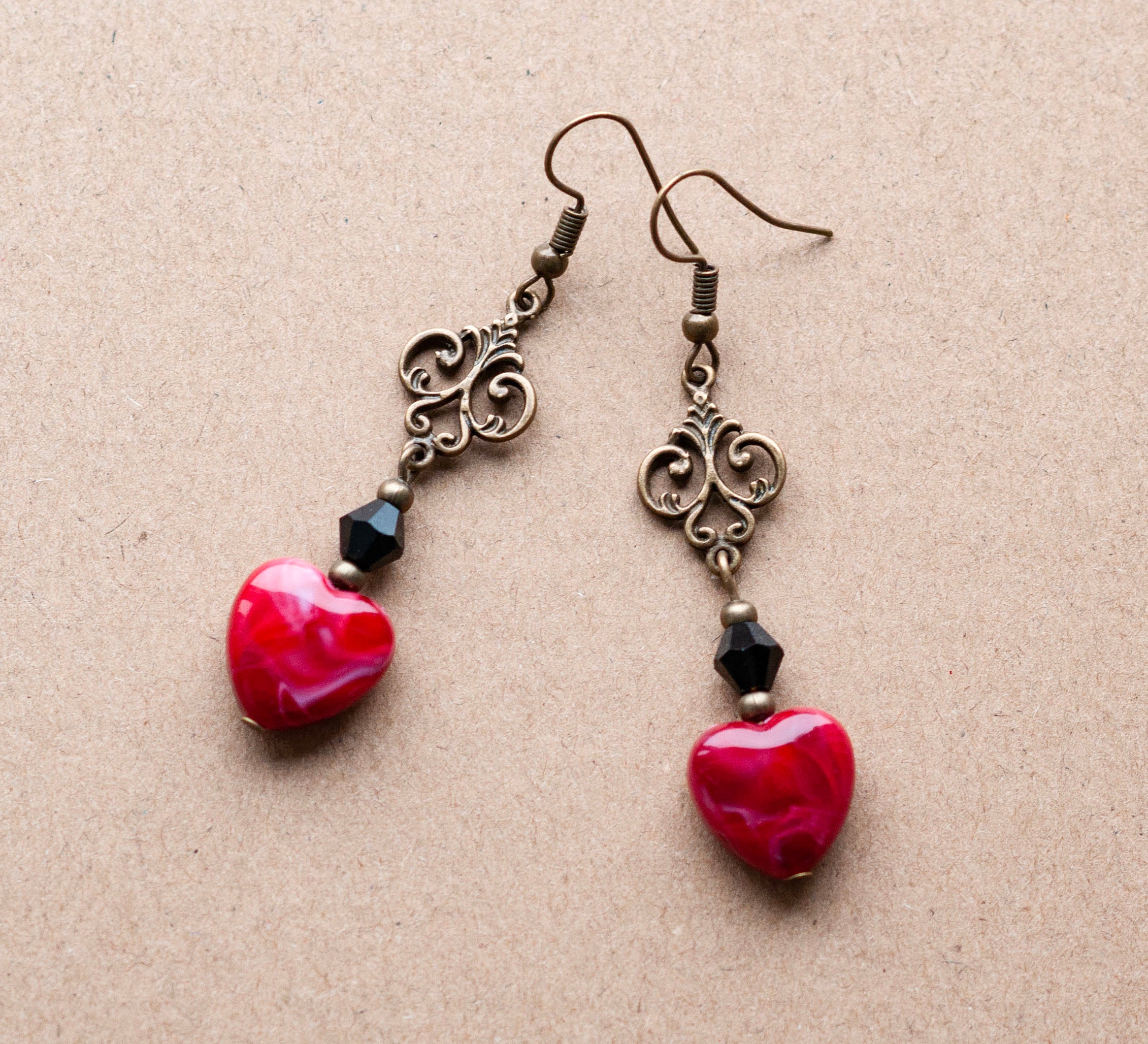 Gothic Earrings featuring dark red teardrop shaped glass crystals Decadent Designs